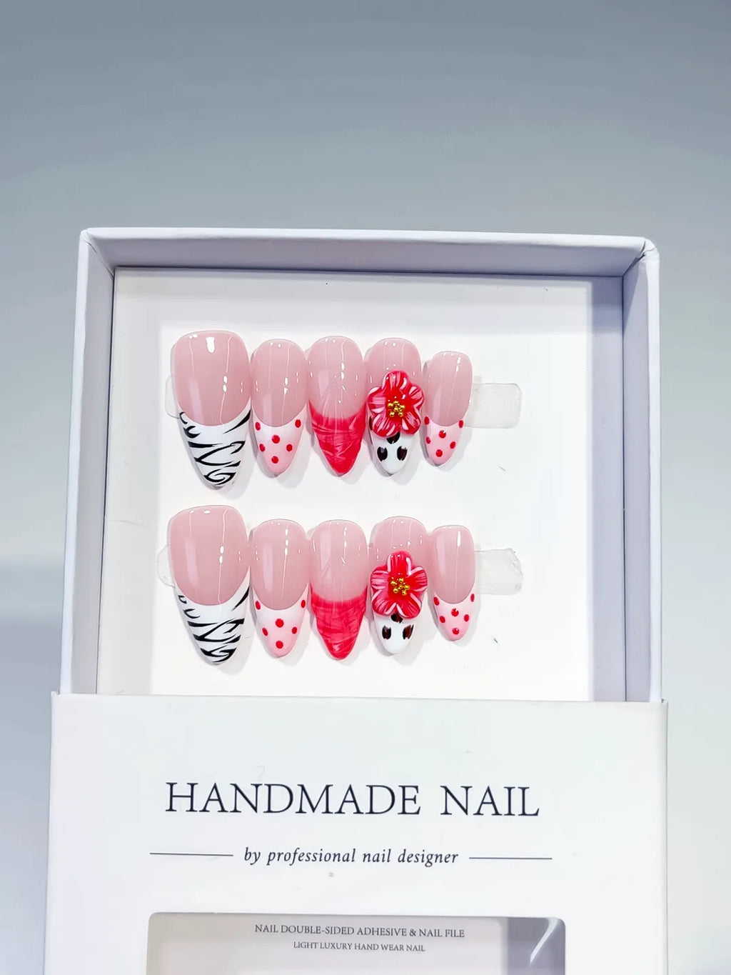 Pink White Red Black Abstract Flower Dot Pattern Animal Print press on nails angled view