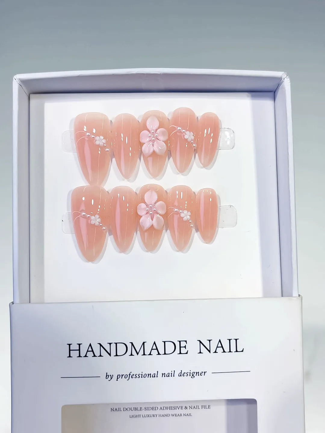 Nude Pink Solid color Flower Pearl Line press on nails angled view