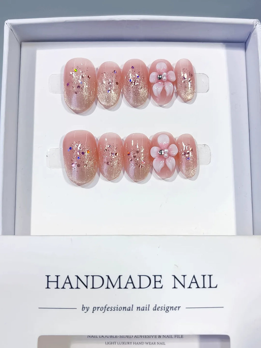 Pink Silver Glitter Flower Confetti press on nails angled view