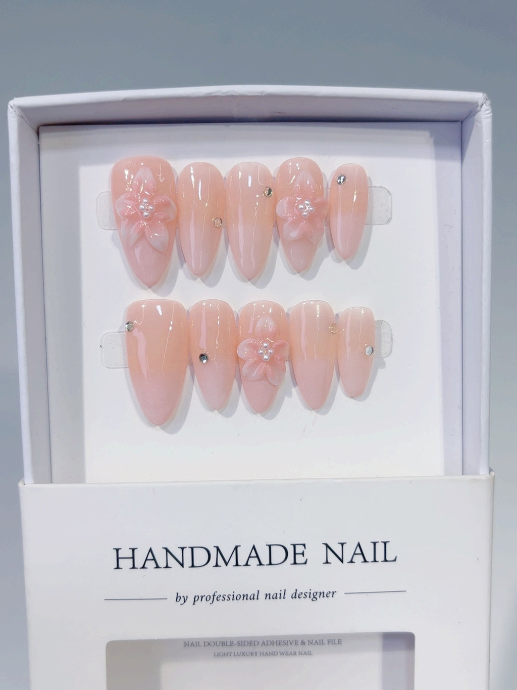 Pink Solid color Flower Rhinestone press on nails angled view