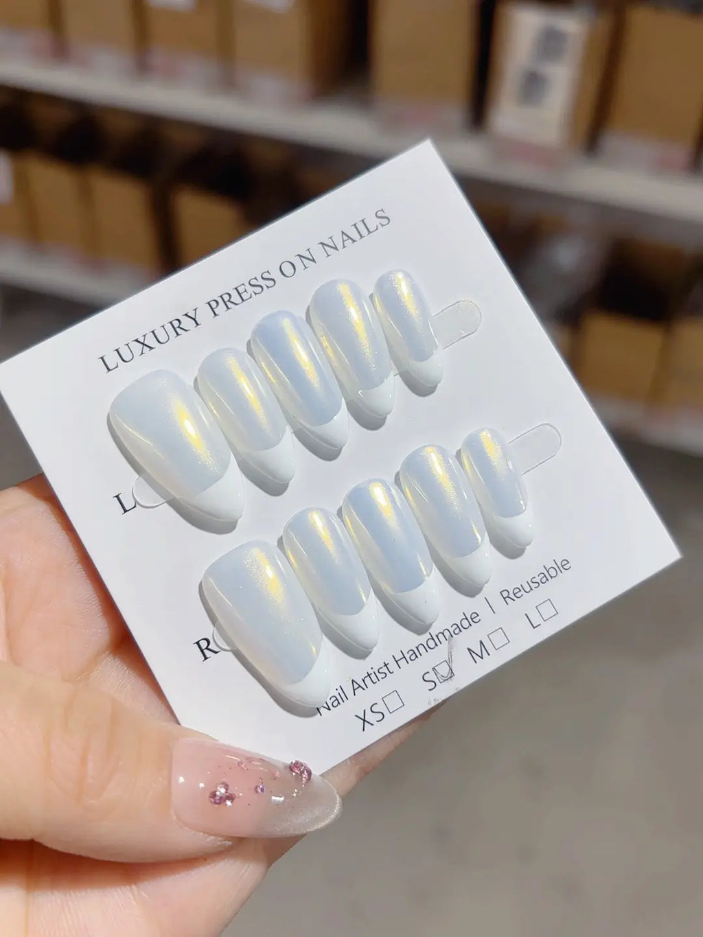 medium almond handmade press on nails white french holographic yellow glow, close-up