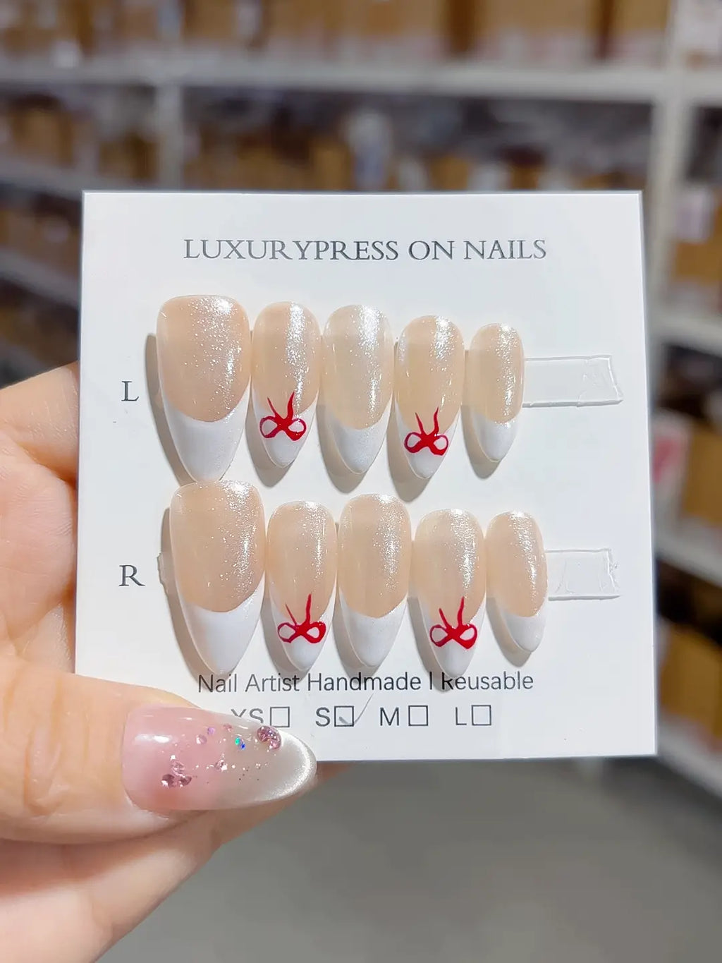 medium almond nude & white french with red bow accents, handmade press on nails centerpiece
