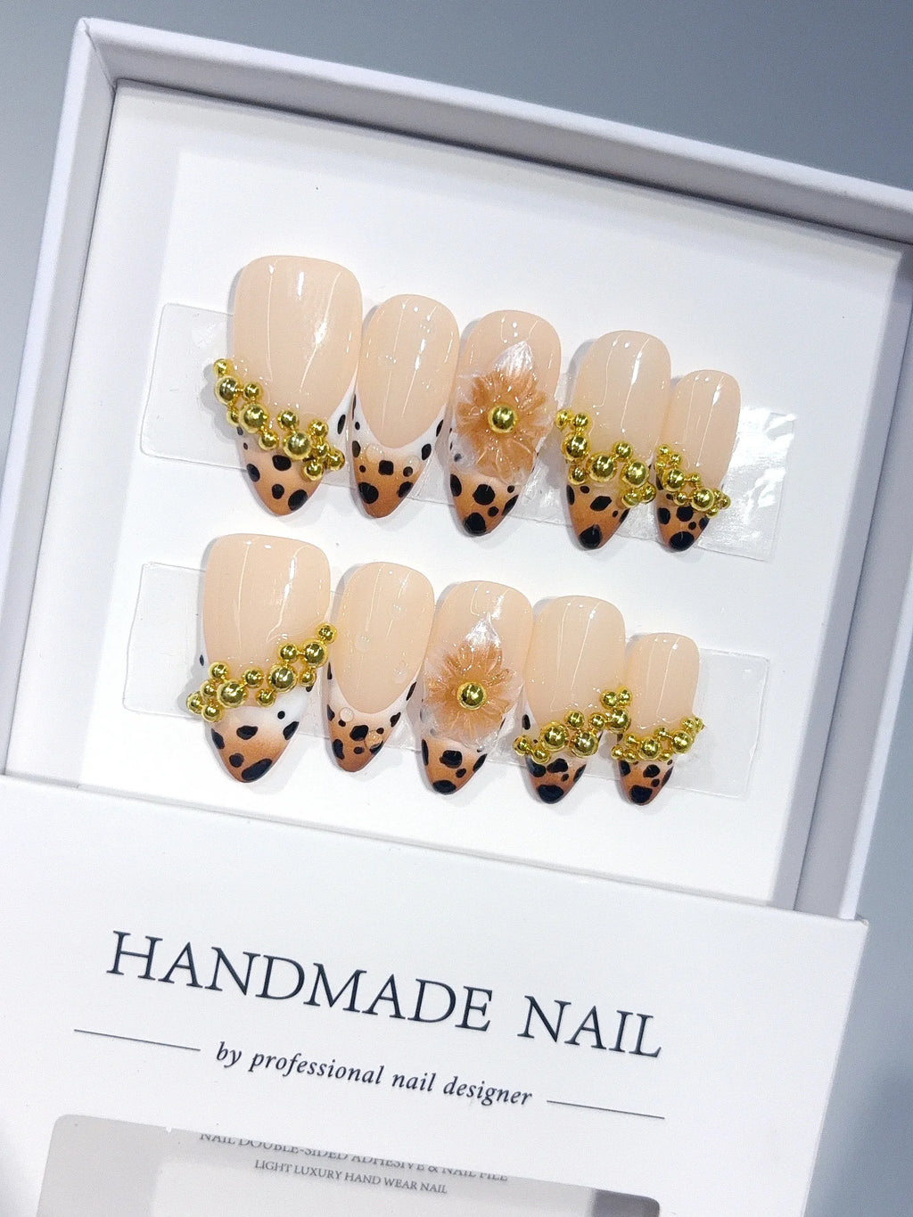 D673 - Medium Nude Caramel Almond Spotted French Tip Gold Beads - view 1