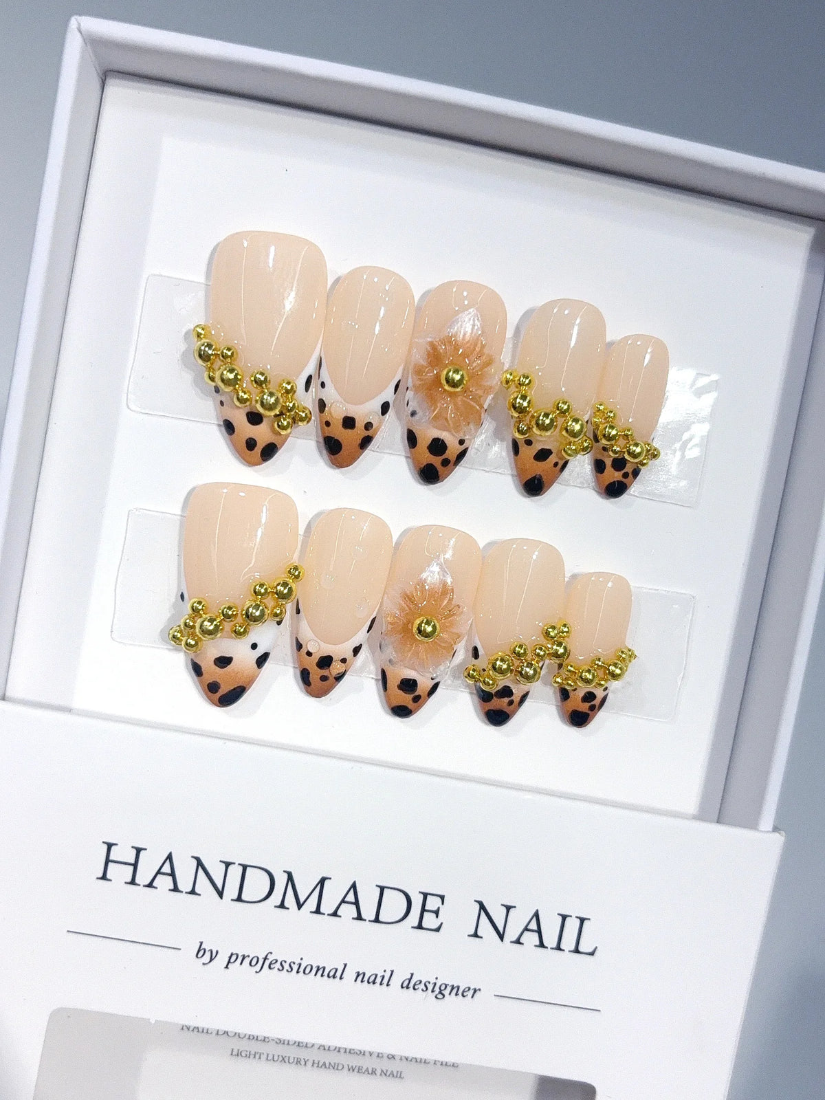 D673 - Medium Nude Caramel Almond Spotted French Tip Gold Beads - view 1