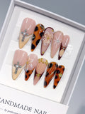 D674 - Long Amber Nude Stiletto Tortoiseshell Cross Rhinestones - view 1