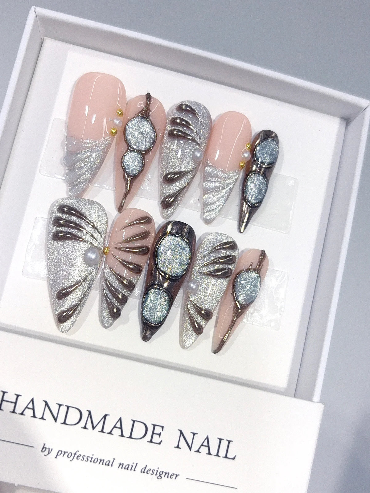 D677 - Long Nude Silver Stiletto Cat Eye Metallic Lines - view 1